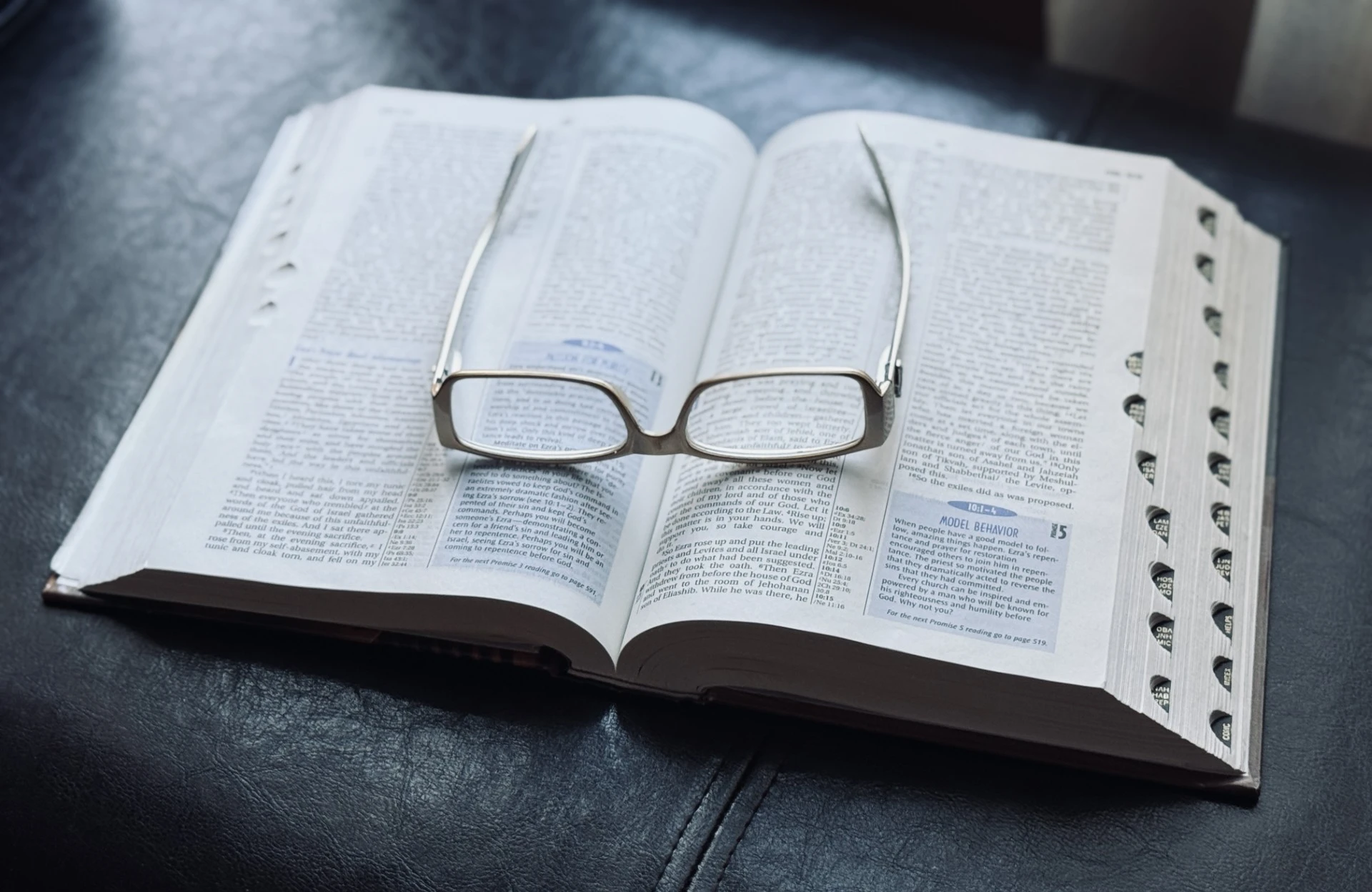 Open Bible illuminated by sunlight